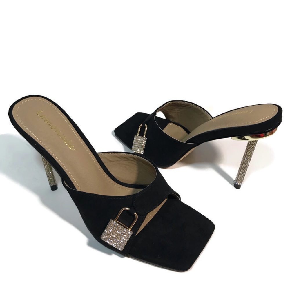 Women’s “Black Locked” heels. Sizes 7, 9, and 11.